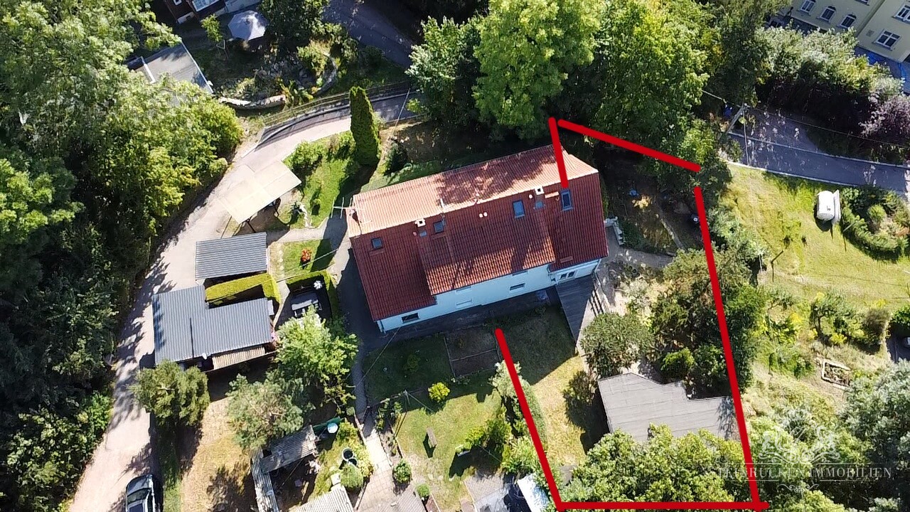 Hausansicht mit eingezeichnetem Gartenbereich