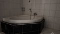 Wohneinheit mit Eckbadewanne