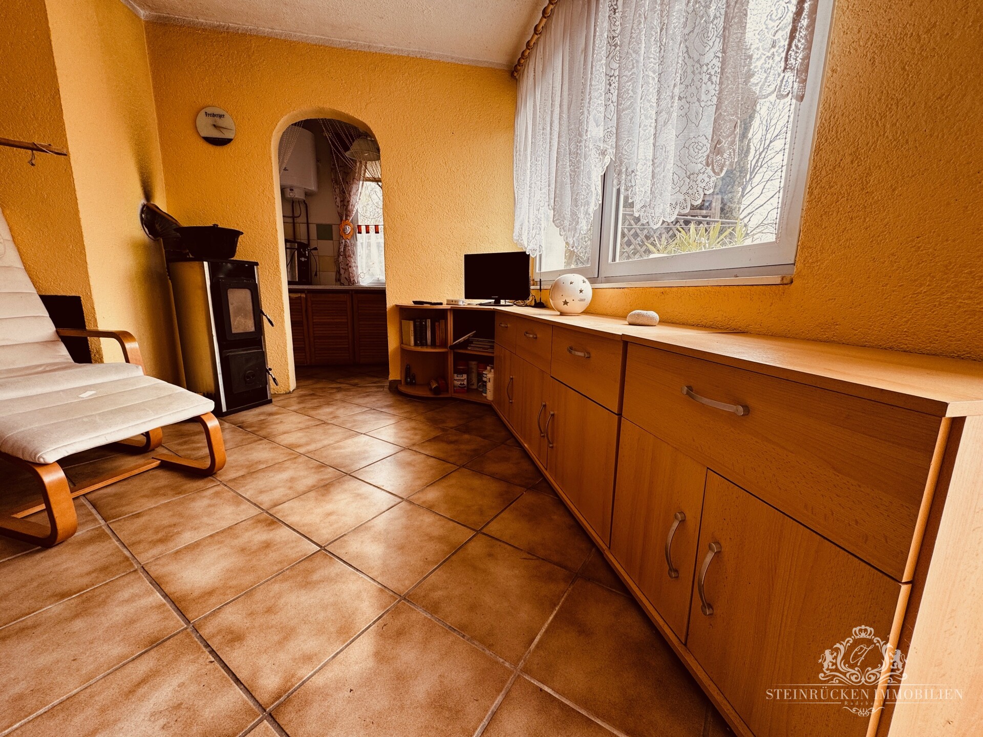 Wohnzimmer mit Kaminofen