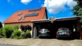 Hausansicht Süd mit Carport