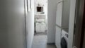 Hauswirtschaftsraum mit Dusche und WC